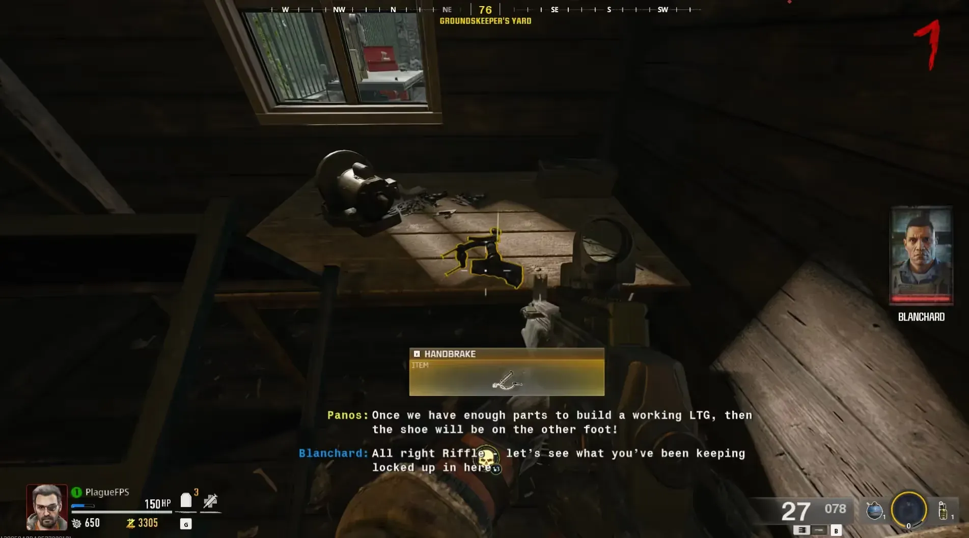 The handbrake waits on the opened toolshed’s table