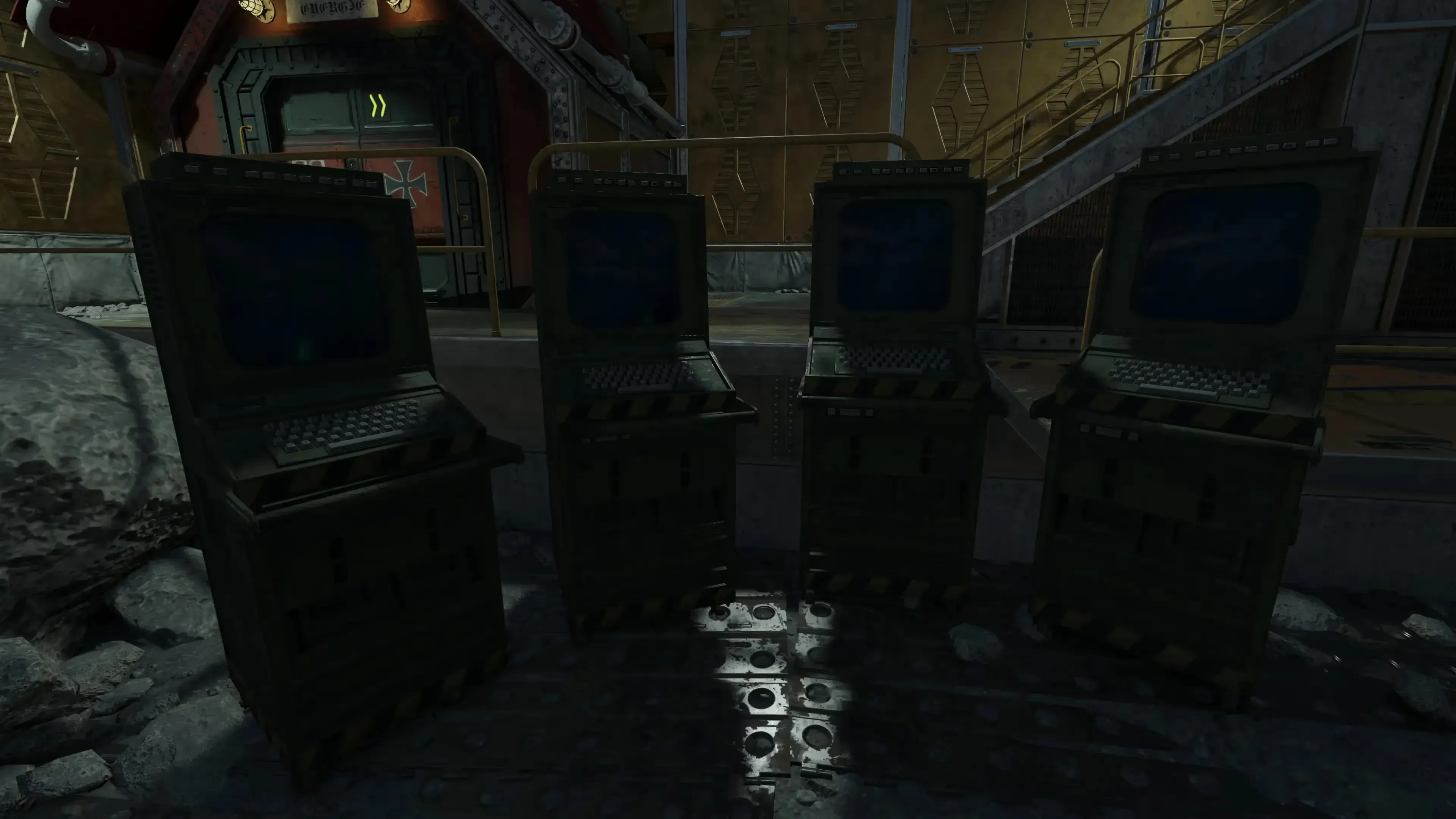 Facing the computers: 1 Red, 2 Green, 3 Blue, 4 Yellow, from left to right.